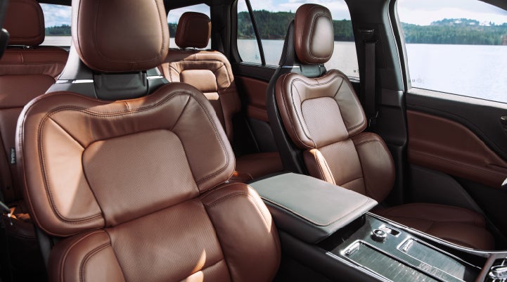 The front row's Perfect Position Seats in a 2024 Lincoln Aviator® Reserve model with Ebony Roast interior | Doggett Lincoln of Beaumont in Beaumont TX