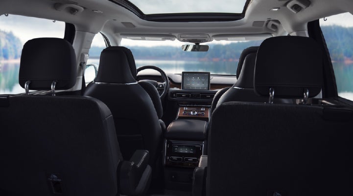 The interior of a 2024 Lincoln Aviator® SUV from behind the second row | Doggett Lincoln of Beaumont in Beaumont TX