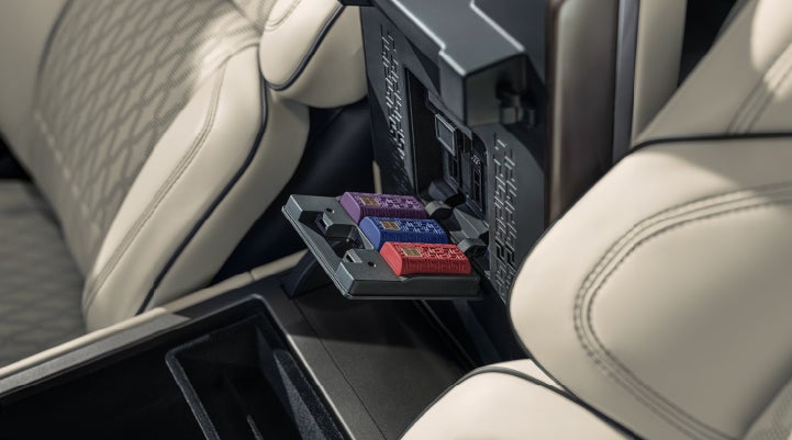 Digital Scent cartridges are shown in the diffuser located in the center arm rest. | Doggett Lincoln of Beaumont in Beaumont TX