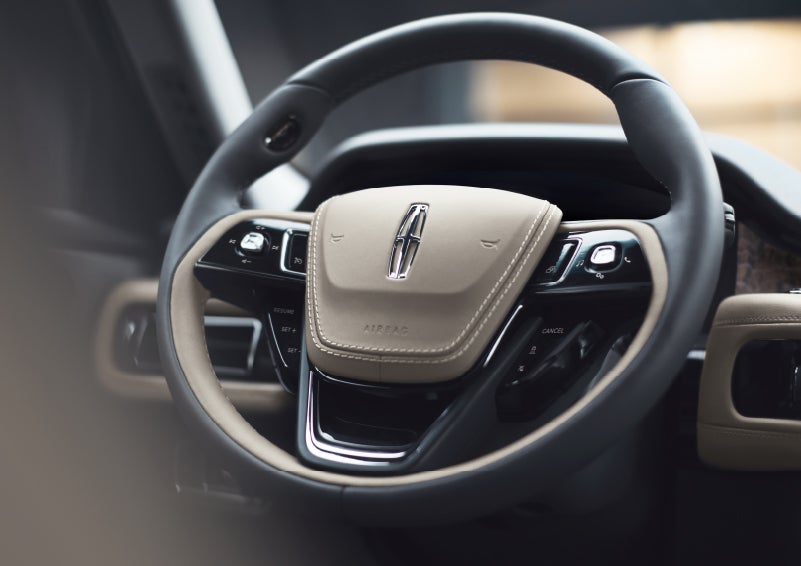 The intuitively placed controls of the steering wheel on a 2024 Lincoln Aviator® SUV | Doggett Lincoln of Beaumont in Beaumont TX